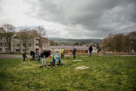 Image from the planting of The Dispersed Memorial Forest in The Crichton & NHS Mountainhall, Dumfries, Scotland.