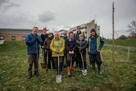 Image from the planting of The Dispersed Memorial Forest in The Crichton & NHS Mountainhall, Dumfries, Scotland.