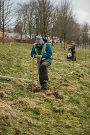 Image from the planting of The Dispersed Memorial Forest in The Crichton & NHS Mountainhall, Dumfries, Scotland.