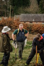 Image from the planting of The Dispersed Memorial Forest in The Crichton & NHS Mountainhall, Dumfries, Scotland.