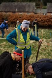Image from the planting of The Dispersed Memorial Forest in The Crichton & NHS Mountainhall, Dumfries, Scotland.