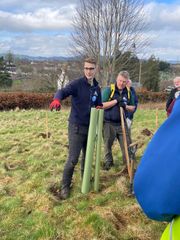 Image from the planting of The Dispersed Memorial Forest in The Crichton & NHS Mountainhall, Dumfries, Scotland.